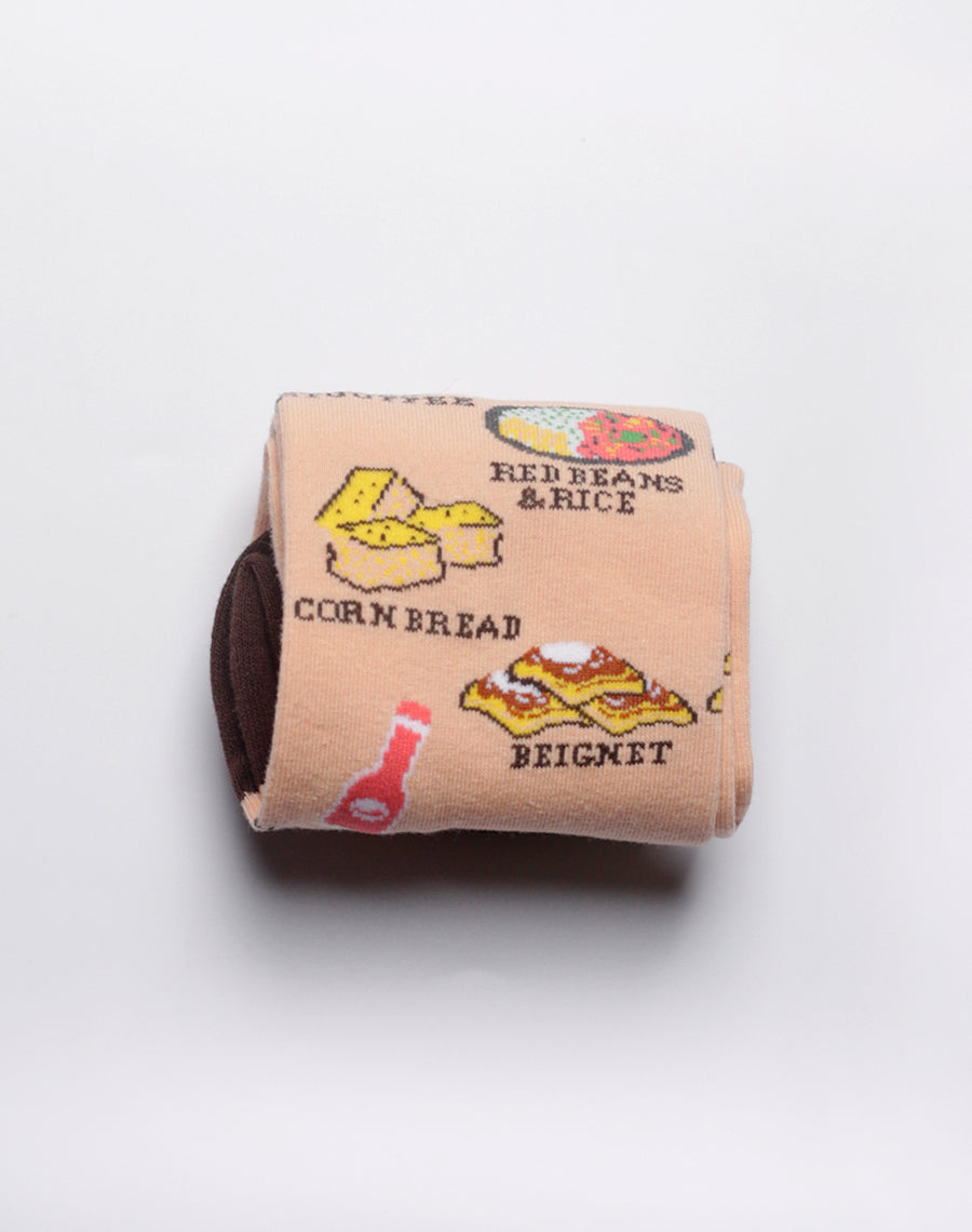 Beige novelty socks with bold NOLA food graphics for everyday wear