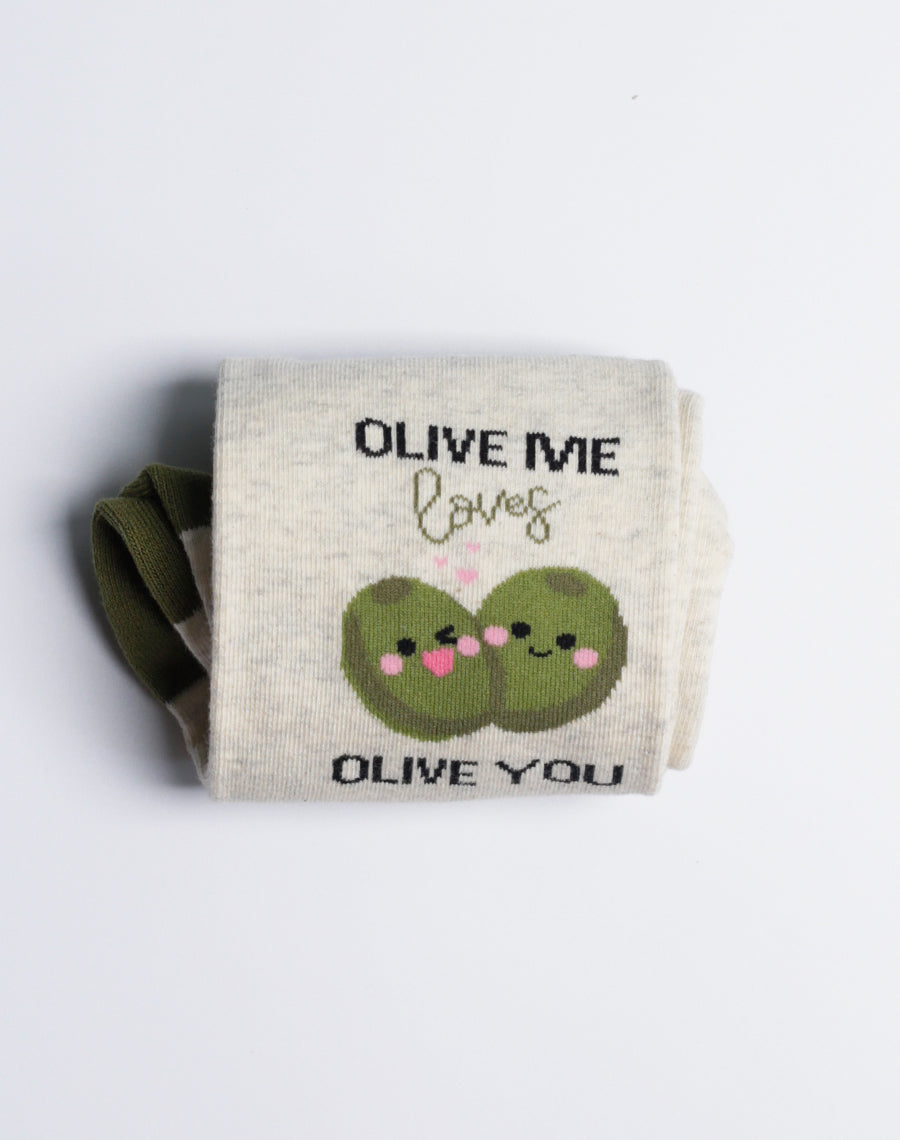 Comfortable and breathable women's socks with a cute olive-themed design, great for casual wear or gifting.