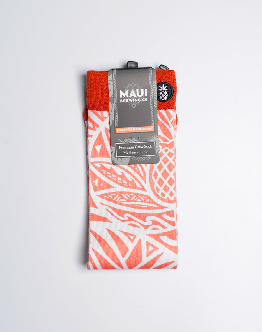 Orange and white Maui Brewing socks with reinforced heel, toe, and ribbed cuff.