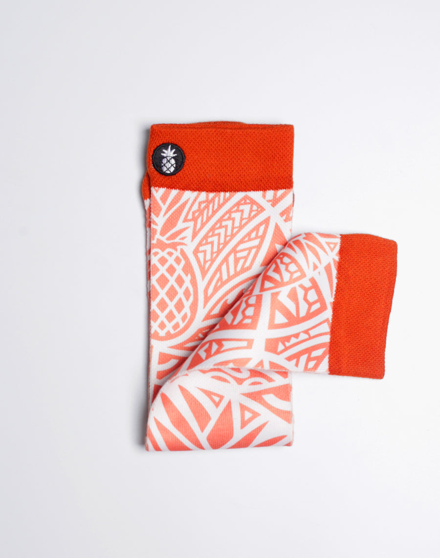 Pineapple Mana Wheat beer-inspired crew socks with bold tribal artwork.