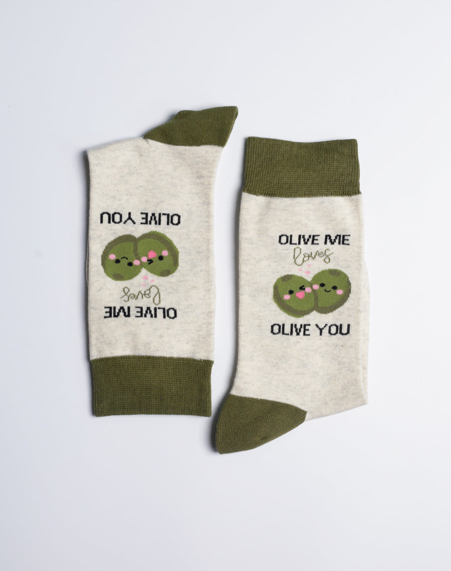 Soft cotton crew socks featuring adorable olives and a romantic pun, adding a quirky touch to any outfit.