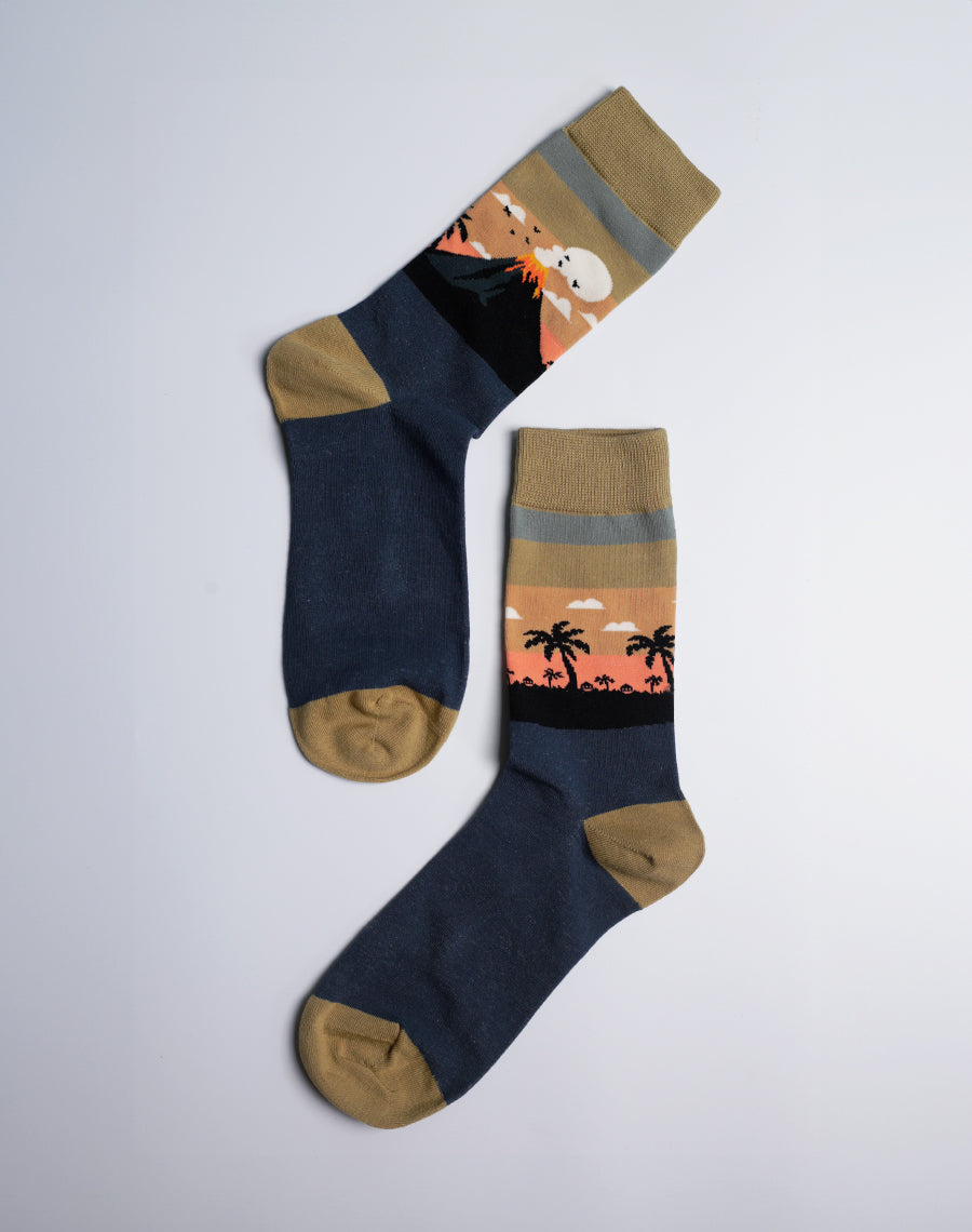 Close-up of the Men's Lava Land Volcano Crew Socks, showcasing the bold lava flow and tropical theme.
