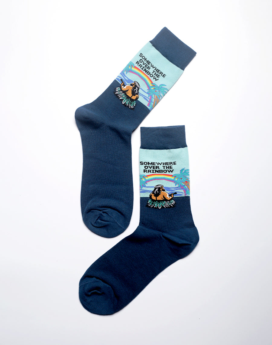 Tropical themed blue socks with colorful rainbow elements