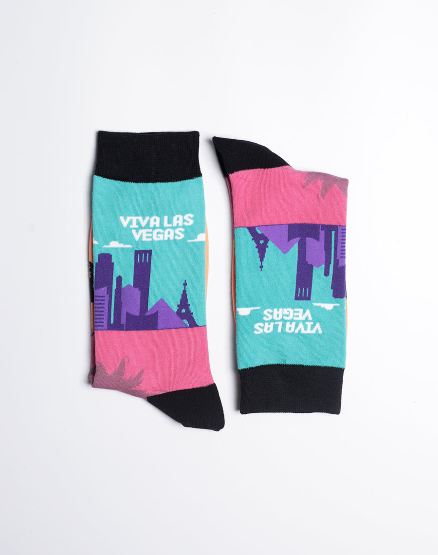 Men's Viva Las Vegas Skyline Crew Socks with a neon-style cityscape and desert-inspired hues.