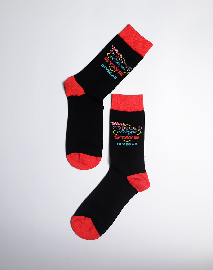 Vegas-inspired crew socks with neon typography and red cuffs, heels, and toes for a striking look.