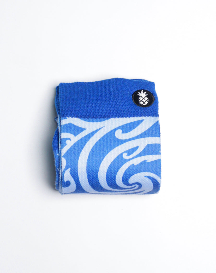 Blue Hawaiian-inspired crew socks with moisture-wicking cotton blend and wave-inspired tribal art.