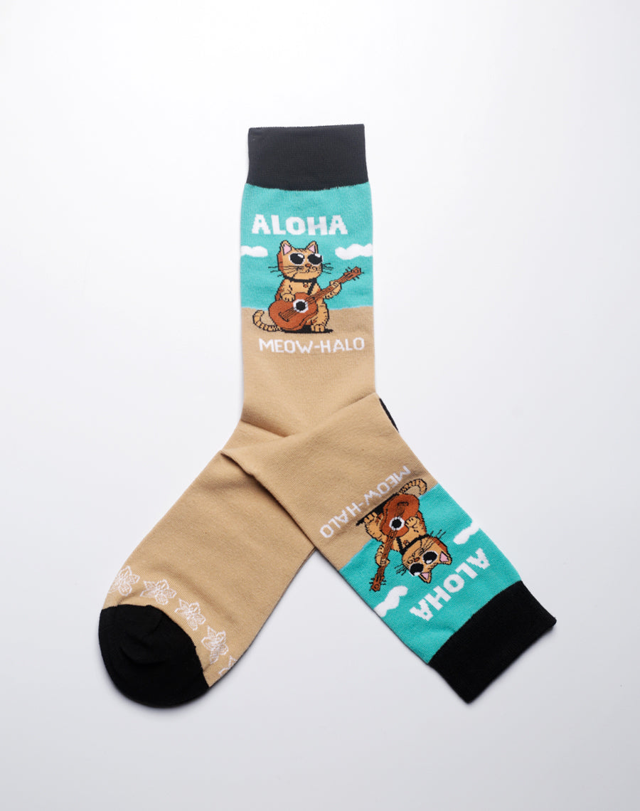 Blue and brown socks with cat playing ukulele on the beach