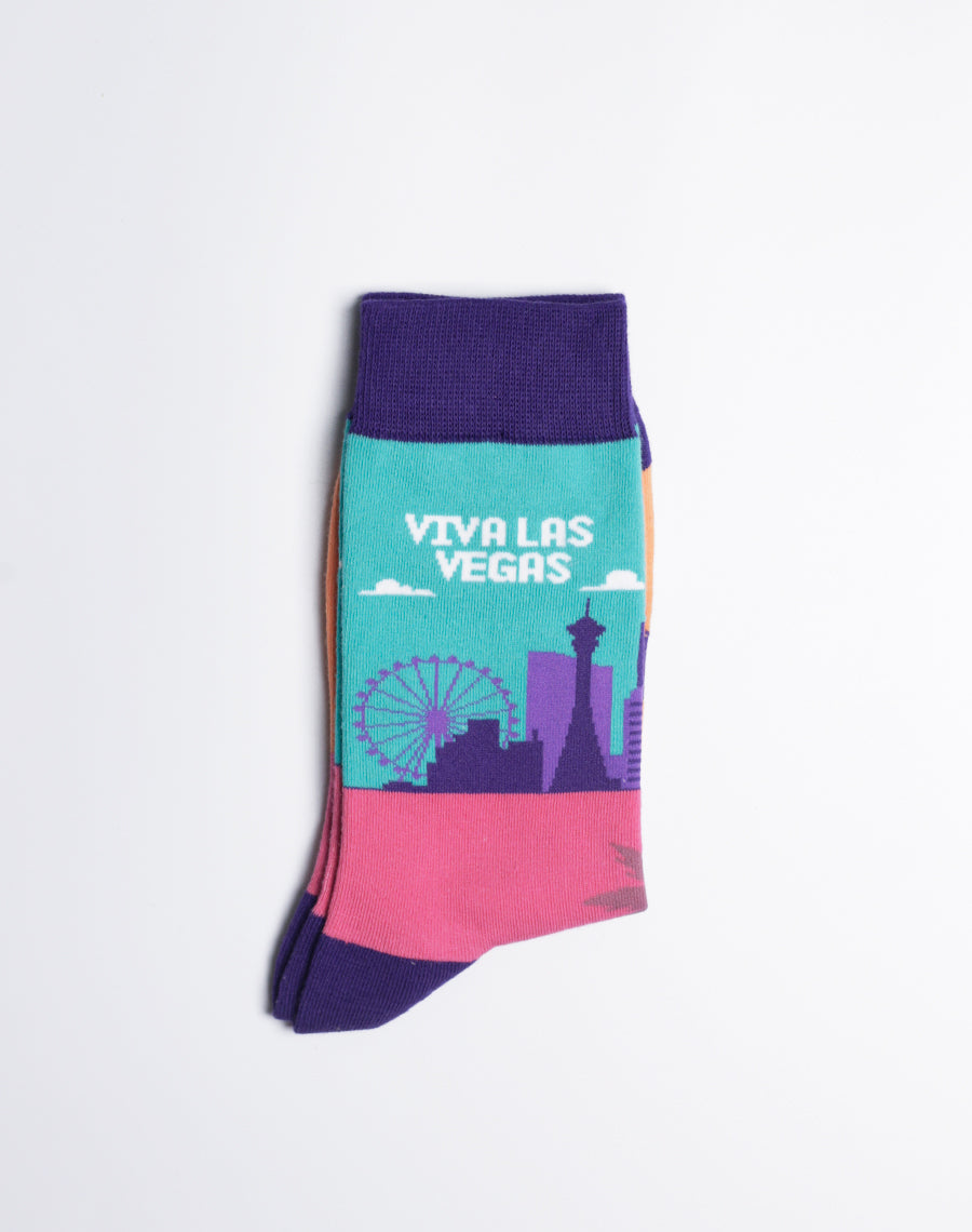 Women's Las Vegas-themed socks with a striking city skyline, Ferris wheel, and tropical palm trees in bold, vivid colors.