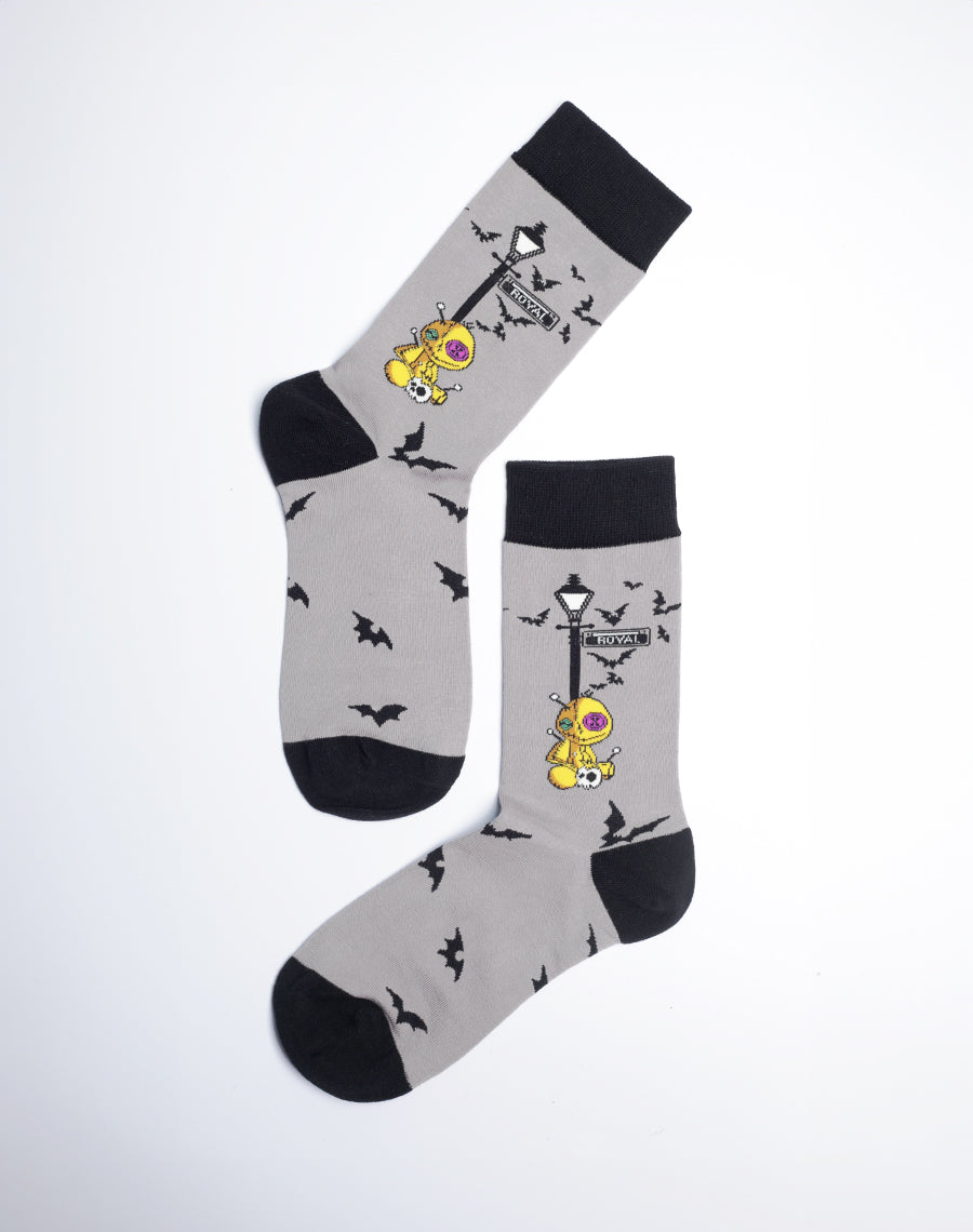 Grey Color Cotton Made Crew Socks for Women - Voodoo doll sitting under a lamp post