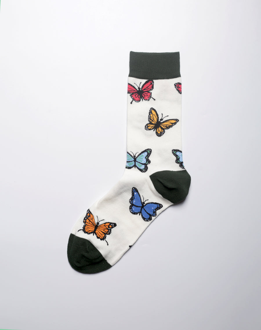 Elegant butterfly themed socks with repeated winged insect pattern and soft stretch fit