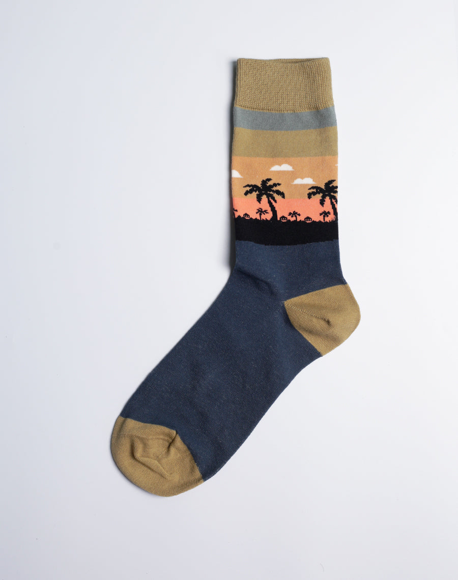 Stylish Hawaiian-themed crew socks with a striking volcano graphic, adding a fiery touch to any outfit.