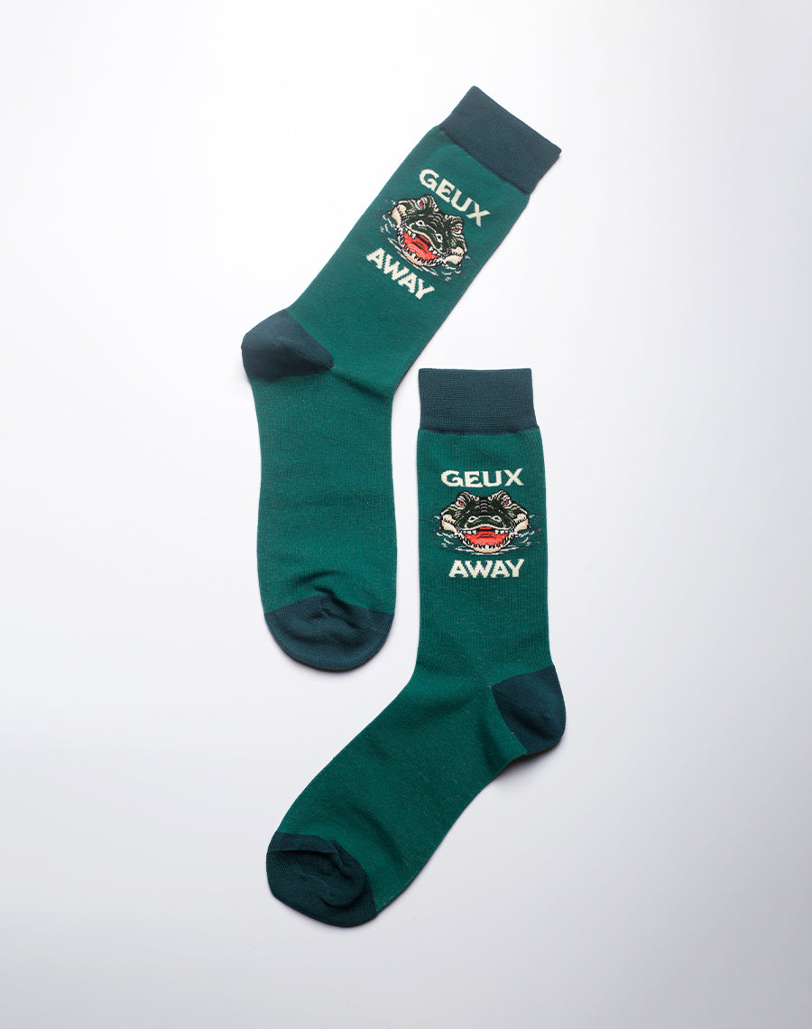 Green novelty socks with Geux Away slogan and gator print