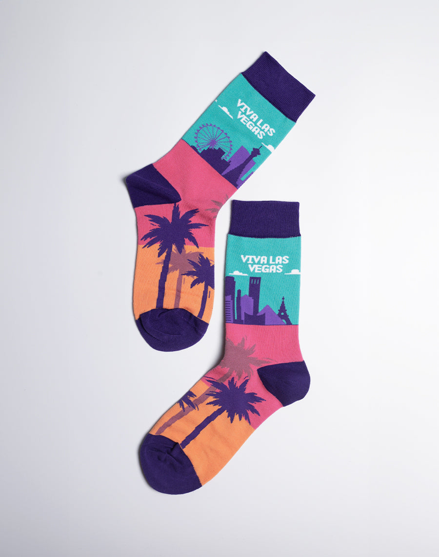 Stylish crew socks for women with a colorful Las Vegas theme, including palm trees, a Ferris wheel, and vibrant cityscape.